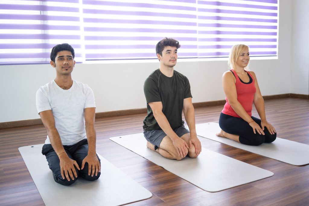 serious beginners sitting seiza pose mats yoga class 1